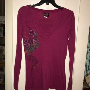 Woman’s Harley Davidson size m long sleeve shirt.